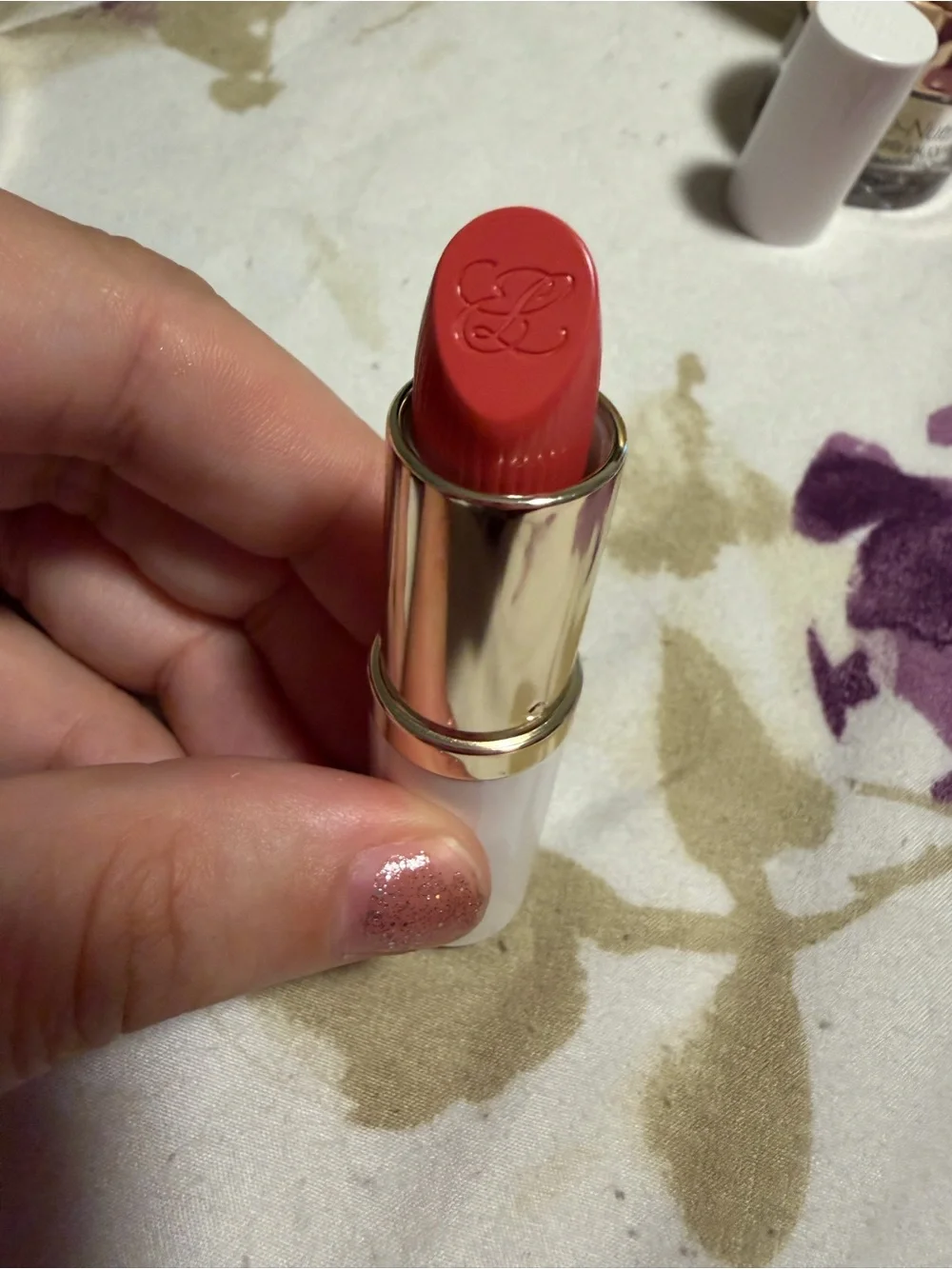 Estee Lauder Warm Coral-Red Lipstick in 250